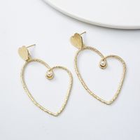 Gold Heart-shaped Cold Wind Pearl Love Earrings Wholesale main image 4