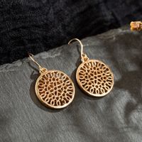 Fashion Round Hollow Carved Flower Alloy Earrings main image 4