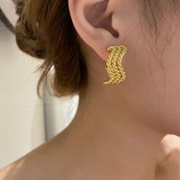 Fashion Gold Plated Metal Texture Wave Winding Earrings main image 1