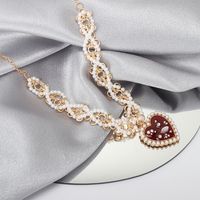 Fashion Heart Pendent Twisted Metal Pearl Chain Necklace main image 3