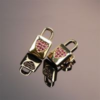 Fashion Copper Inlaid Color Zircon Lock Carved Earrings main image 1