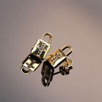 Fashion Copper Inlaid Color Zircon Lock Carved Earrings main image 4