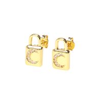 Fashion Copper Inlaid Color Zircon Lock Carved Earrings sku image 4
