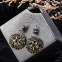 Fashion Hollow Carved Long Round Tassel Earrings main image 1