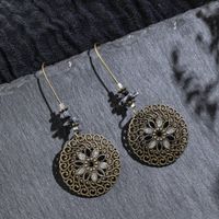 Fashion Hollow Carved Long Round Tassel Earrings main image 3