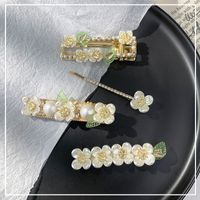 Wholesale Korean Shell Flower Green Leaf Rhinestone Hairpin main image 1