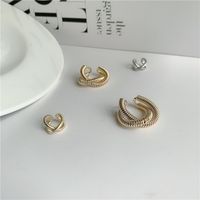 Fashion Geometric Cross Metal Winding Alloy Earrings Wholesale main image 4