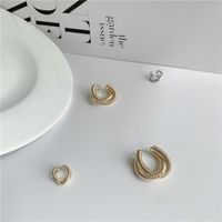 Fashion Geometric Cross Metal Winding Alloy Earrings Wholesale main image 3