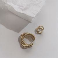 Fashion Geometric Cross Metal Winding Alloy Earrings Wholesale sku image 1