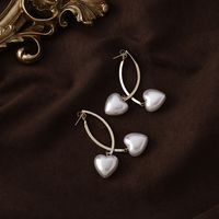 Simple Heart-shaped Pearl Cross Long Earrings main image 4