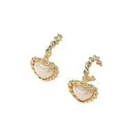 Fashion Twist Heart-shape Pearl Alloy Earrings Wholesale main image 5