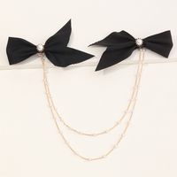 Moda Coreana Nuevo Estilo Simple Bowknot Doble Cadena Perla Palabra Clip main image 1