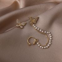 Simple Asymmetrical Pearl Tassel Butterfly Earrings main image 5