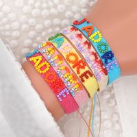 Bohemian Ribbon Rice Bead Woven Rainbow Letter Bracelet main image 1