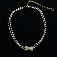 Simple Diamond-studded Bowknot Handmade Pearl Multi-layer Necklace main image 4