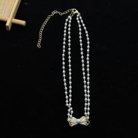 Simple Diamond-studded Bowknot Handmade Pearl Multi-layer Necklace main image 6