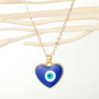 Fashion Peach Heart Round Devil's Eye Pendant Resin Necklace main image 4