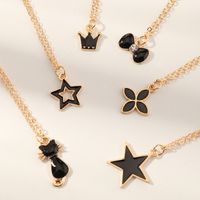 Simple Black Dripping Flower Five-pointed Star Crown Cat Pendant Necklace Set main image 5