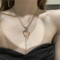 Korean Asymmetrical Heart-shaped Tassel Crystal Earrings Necklace main image 6