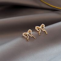 Korean Style Pearl Bow Earrings Wholesale main image 3
