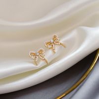 Korean Style Pearl Bow Earrings Wholesale main image 5