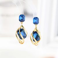 Vente En Gros Boucles D&#39;oreilles Simples En Cuivre À Pompon En Cristal Bleu main image 1