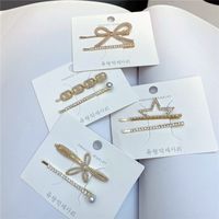 Korean Style Bowknot Flower Diamond Pearl One Word Clip Pair Set main image 5
