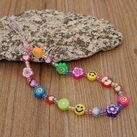 Simple Ethnic Smiling Face Woven Beaded Mobile Phone Chain main image 5