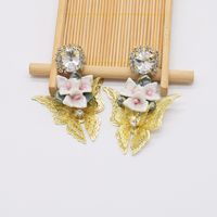 Retro Metal Hollow Butterfly Diamond Flower Earrings main image 3