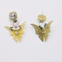 Retro Metal Hollow Butterfly Diamond Flower Earrings main image 5