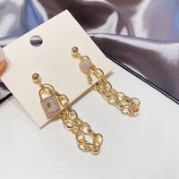 Fashion Asymmetric Key Metal Chain Tassel Copper Earrings main image 3