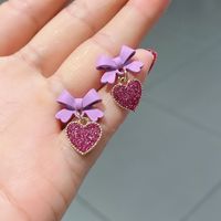 Lindos Aretes En Forma De Corazón Con Lazo Dulce main image 3