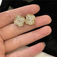 Korean Style C-shaped Gold Plated Four-petal Flower Micro-inlaid Earrings sku image 2