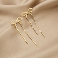 Korean Style Flash Diamond Long Pearl Bow Earrings sku image 1
