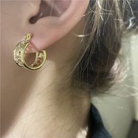 Korean Style C-shaped Gold Plated Four-petal Flower Micro-inlaid Earrings main image 3