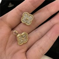 Korean Style C-shaped Gold Plated Four-petal Flower Micro-inlaid Earrings main image 6