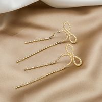 Korean Style Flash Diamond Long Pearl Bow Earrings main image 4