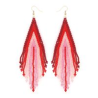 Boucles D&#39;oreilles Pompon En Perles De Riz Géométriques Exotiques Portées À La Main main image 5