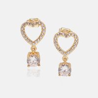 Fashion Gold-plated Four-claw Zircon Hollow Heart Earrings main image 1
