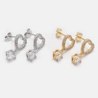 Fashion Gold-plated Four-claw Zircon Hollow Heart Earrings main image 4