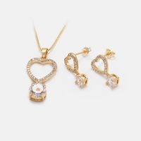 Fashion Gold-plated Four-claw Zircon Hollow Heart Earrings main image 6