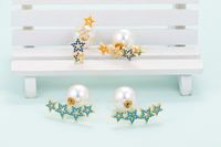 Fashion Hollow Five-pointed Star Diamond Inlaid Colorful Zircon Earrings main image 4