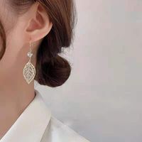Nihaojewelry Korean Style Hollow Double Leaf Inlaid Rhinestone Earrings Wholesale Jewelry main image 3