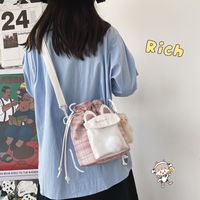 Wholesale Simple Lattice Rabbit Ear Shape Messenger Canvas Bucket Bag Nihaojewelry main image 2