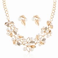 Nihaojewelry Fashion Artificial Pearl Crystal Leaf Necklace Earrings Set Wholesale Jewelry main image 1