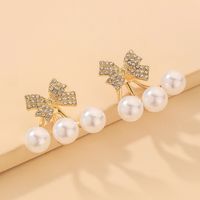 Nihaojewelry Korean Style Pearl Rhinestone Bow Earrings Wholesale Jewelry main image 1