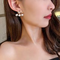 Nihaojewelry Korean Style Pearl Rhinestone Bow Earrings Wholesale Jewelry main image 3
