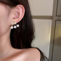 Nihaojewelry Korean Style Pearl Rhinestone Bow Earrings Wholesale Jewelry main image 4