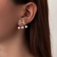 Nihaojewelry Korean Style Pearl Rhinestone Bow Earrings Wholesale Jewelry main image 5