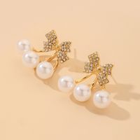 Nihaojewelry Korean Style Pearl Rhinestone Bow Earrings Wholesale Jewelry sku image 1